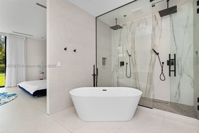 Set on a 39,639 sqft corner lot, this 2023 modern estate offers - photo 39