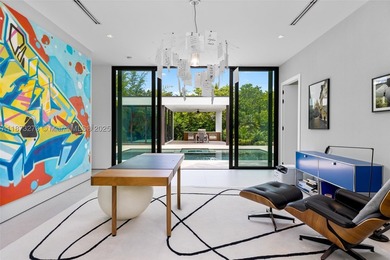 Set on a 39,639 sqft corner lot, this 2023 modern estate offers - photo 43