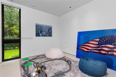 Set on a 39,639 sqft corner lot, this 2023 modern estate offers - photo 49