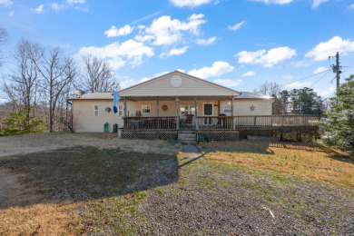 NEW PRICE!! LAKE HOME WITH A DOCK ON 3 LOTS - Lake Home For Sale in Clarkson, Kentucky