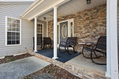 Set on 3.55 waterfront acres, this one-level custom home offers