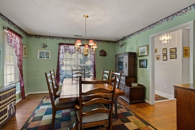 Set on 3.55 waterfront acres, this one-level custom home offers