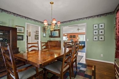 Set on 3.55 waterfront acres, this one-level custom home offers