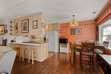 Set on 3.55 waterfront acres, this one-level custom home offers