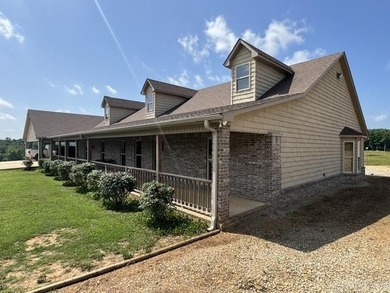 Built in 2021, this 4,304 sq. ft. brick home anchors an - photo 31