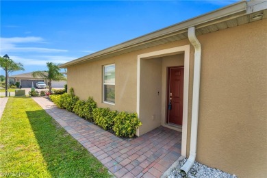 Lake Home For Sale in Lehigh Acres, Florida