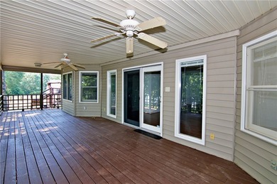 Experience lake living at its finest in this charming 4-bedroom - photo 12