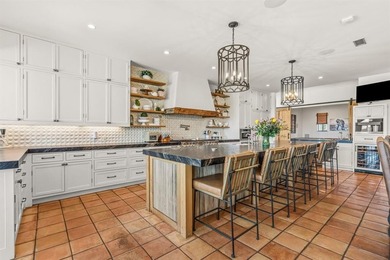 Set on an expansive nearly 14-acre estate, 321 Verna Trail N is - photo 14