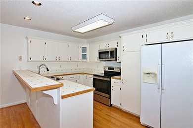 Experience lake living at its finest in this charming 4-bedroom - photo 15