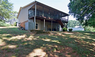 Experience lake living at its finest in this charming 4-bedroom - photo 36