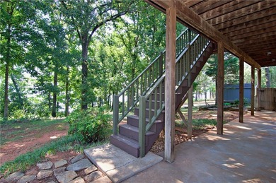 Experience lake living at its finest in this charming 4-bedroom - photo 38