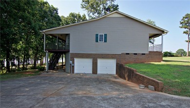Experience lake living at its finest in this charming 4-bedroom - photo 42