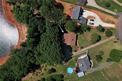 Experience lake living at its finest in this charming 4-bedroom - photo 47