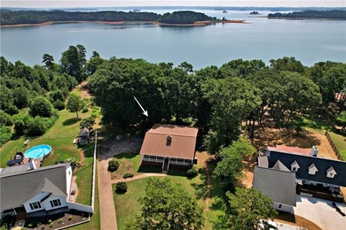 Experience lake living at its finest in this charming 4-bedroom - photo 50