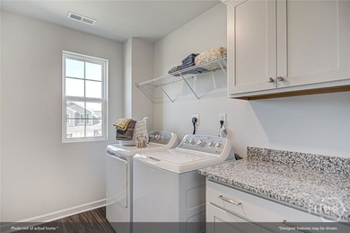 The Russell is a versatile two-story home featuring four - photo 26