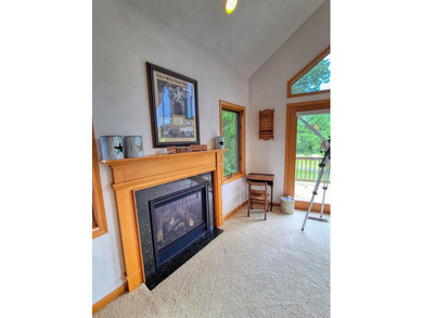 Nestled along a stunning golf course with beautiful views of the - photo 11