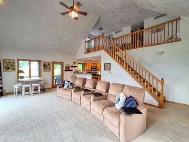 Nestled along a stunning golf course with beautiful views of the - photo 12