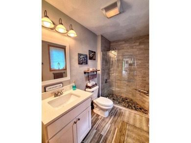 Nestled along a stunning golf course with beautiful views of the - photo 17