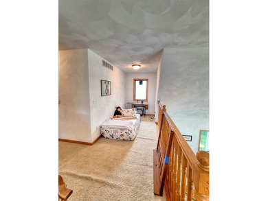 Nestled along a stunning golf course with beautiful views of the - photo 18