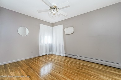 Welcome to this spacious semi-detached home located in one of - photo 18
