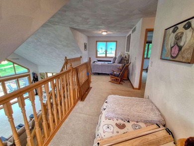Nestled along a stunning golf course with beautiful views of the - photo 19
