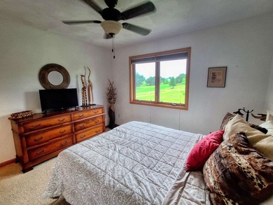Nestled along a stunning golf course with beautiful views of the - photo 22