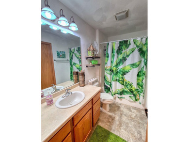 Nestled along a stunning golf course with beautiful views of the - photo 23