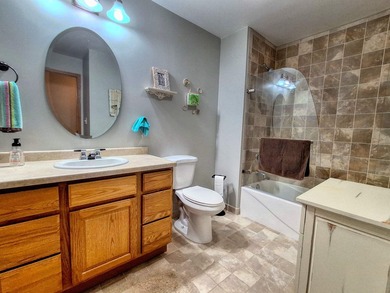 Nestled along a stunning golf course with beautiful views of the - photo 28