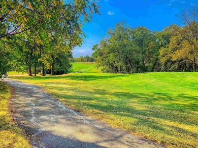 Nestled along a stunning golf course with beautiful views of the - photo 35