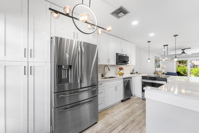 Experience the best of Florida living in this stunning villa! - photo 6