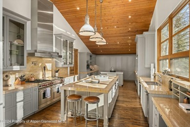 Located in the exclusive Maroon Creek Club, this timeless - photo 14