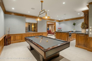 Located in the exclusive Maroon Creek Club, this timeless - photo 16