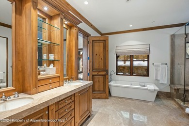 Located in the exclusive Maroon Creek Club, this timeless - photo 21