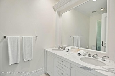 Located in the exclusive Maroon Creek Club, this timeless - photo 23