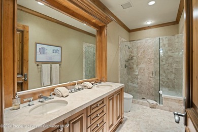 Located in the exclusive Maroon Creek Club, this timeless - photo 29