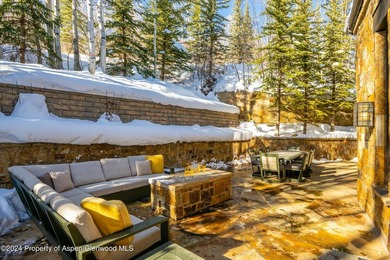 Located in the exclusive Maroon Creek Club, this timeless - photo 30