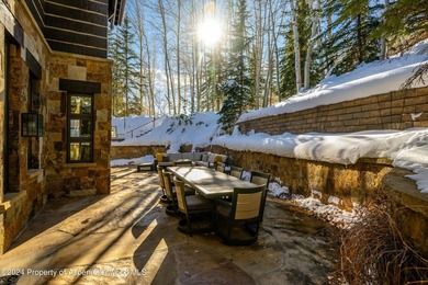 Located in the exclusive Maroon Creek Club, this timeless - photo 31