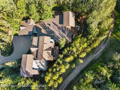 Located in the exclusive Maroon Creek Club, this timeless - photo 33