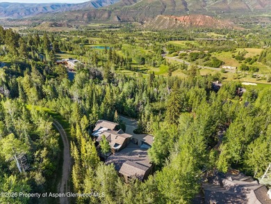 Located in the exclusive Maroon Creek Club, this timeless - photo 34