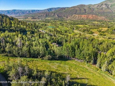 Located in the exclusive Maroon Creek Club, this timeless - photo 35