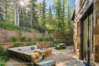 Located in the exclusive Maroon Creek Club, this timeless - photo 36