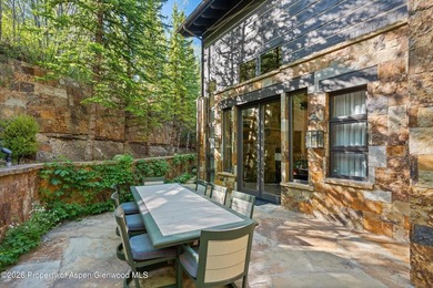Located in the exclusive Maroon Creek Club, this timeless - photo 37