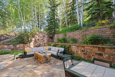 Located in the exclusive Maroon Creek Club, this timeless - photo 39