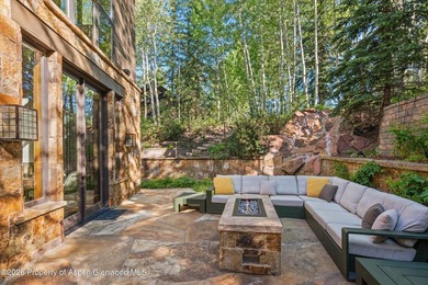 Located in the exclusive Maroon Creek Club, this timeless - photo 40