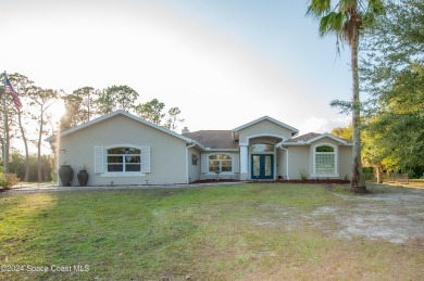 Lake Home For Sale in Titusville, Florida