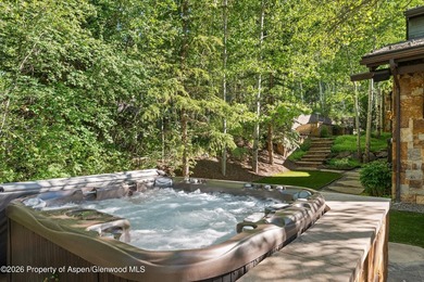 Located in the exclusive Maroon Creek Club, this timeless - photo 42