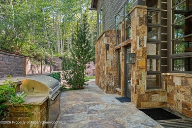 Located in the exclusive Maroon Creek Club, this timeless - photo 44