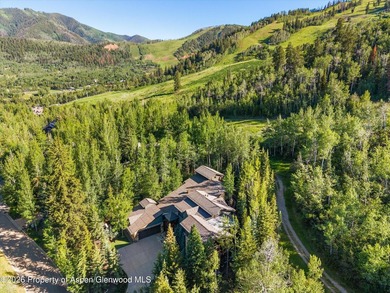 Located in the exclusive Maroon Creek Club, this timeless - photo 46
