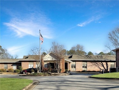 WALK-IN TUB and gleaming hardwoods and washer/dryer in unit in
