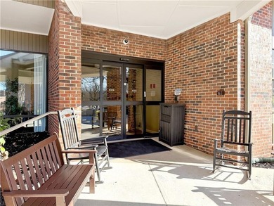 WALK-IN TUB and gleaming hardwoods and washer/dryer in unit in